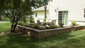 Stone patio with wall.